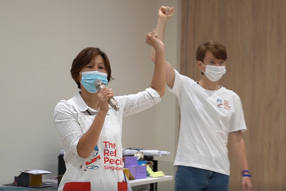 The Red Pencil art therapist Ms Yoko Choi (left) has seen the students grow immensely during her time leading the classes. (Screenshot by Pan Zaixiang)