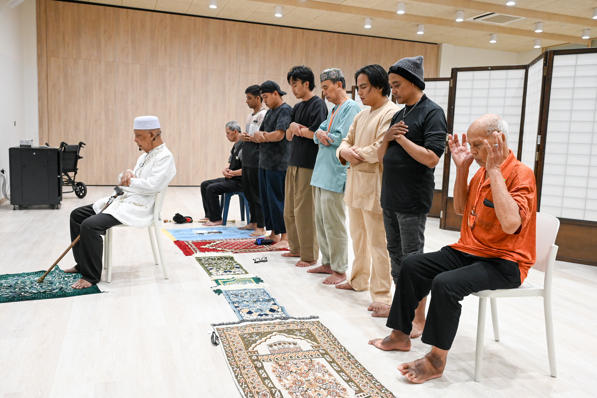 Volunteers and Muslim Care Recipients Break Fast Together in Ramadan Celebration 